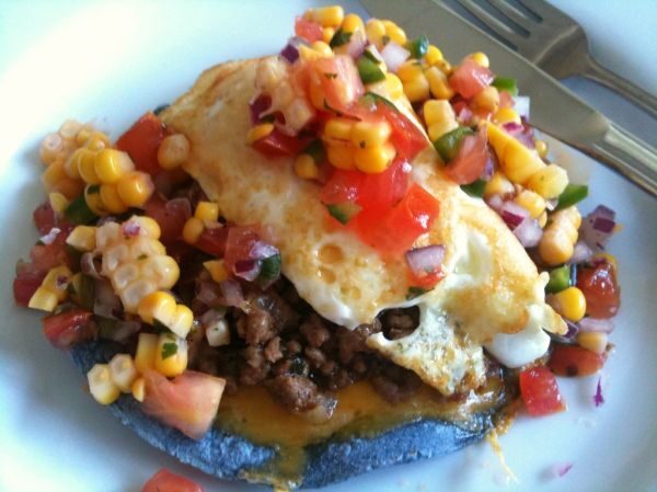 Huevos rancheros with a fried egg, fresh salsa, corn and beans, cooked by a private chef in Jaco Beach