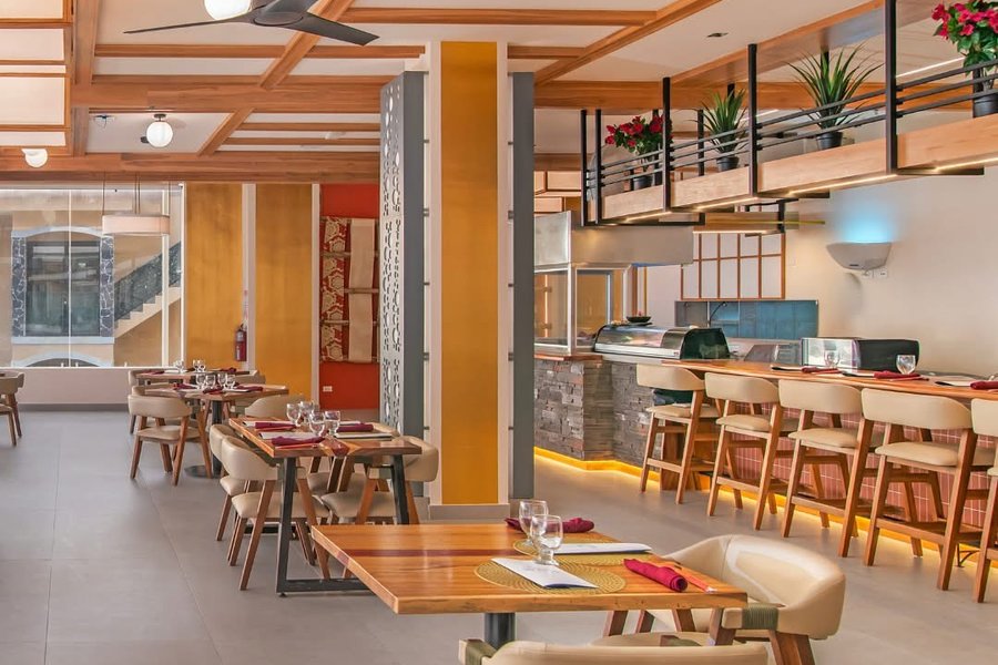 Clarita's open-air restaurant and sushi bar interior in Jacó