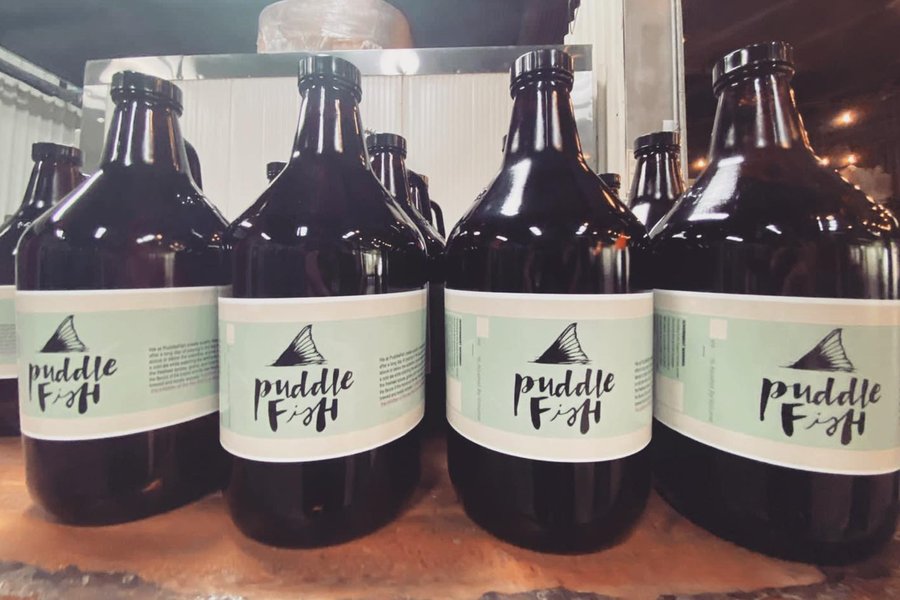 PuddleFish house-brewed beer growlers