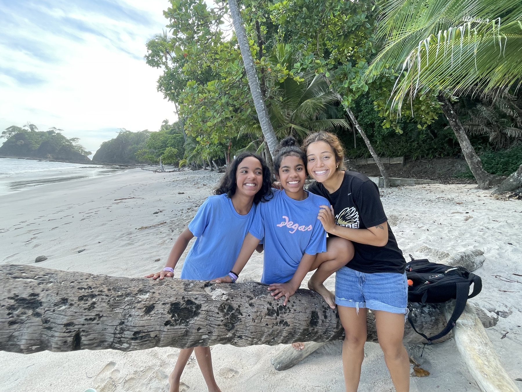 Friends enjoying the calm white-sand beach at Playa Blanca near Jaco — best properties near Jaco Beach, Costa Rica