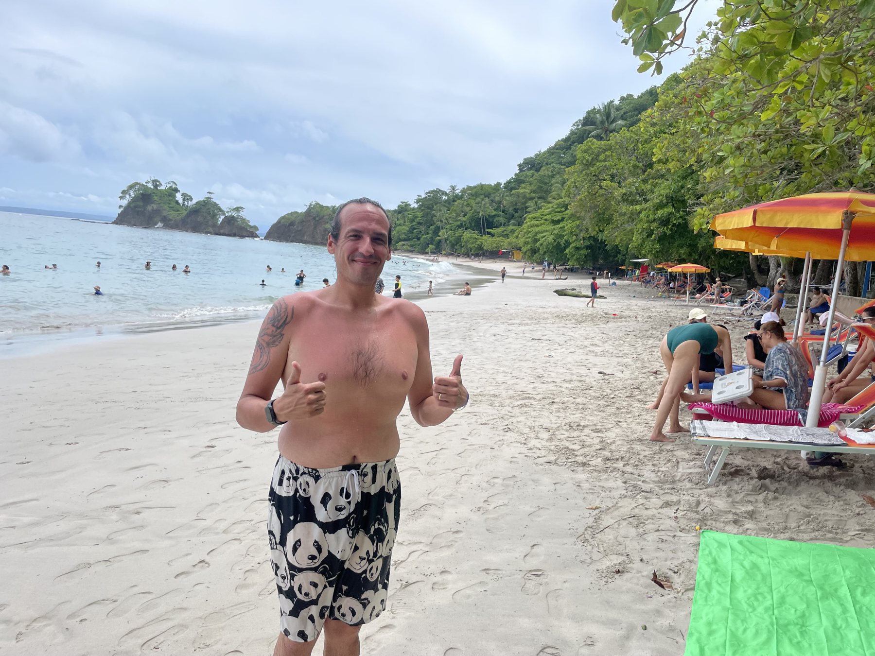People enjoying the beach near Punta Leona and Jaco Beach — best priced real estate near Jaco for those who want a life by the water