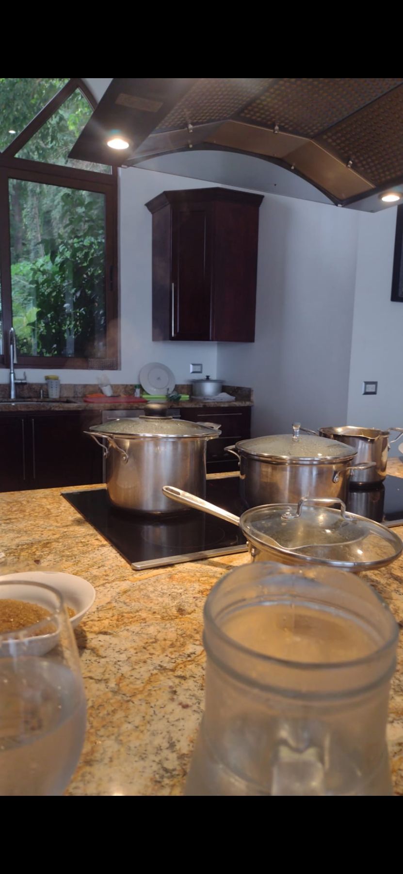 A private chef cooking in a Jaco Beach villa kitchen