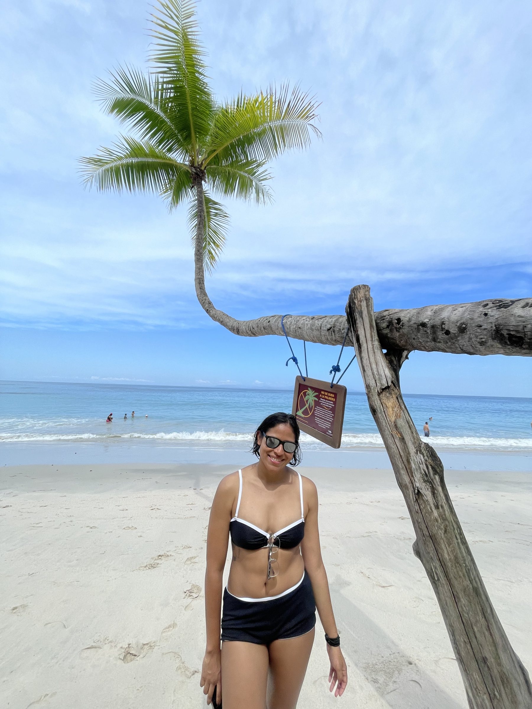 Palm-lined white-sand beach at Playa Blanca near Punta Leona — Jaco Beach real estate, best priced real estate near Jaco, Costa Rica