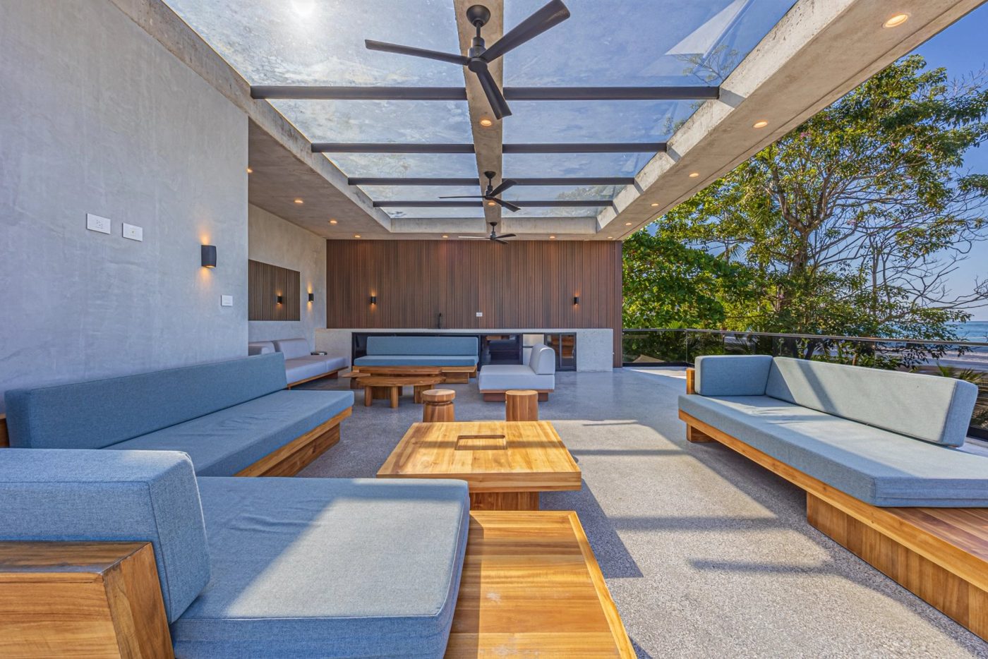 Casa VIP 1 luxury beachfront villa in Jacó — loungers on the deck