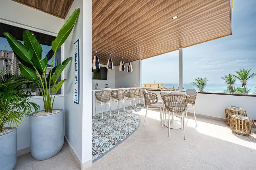 Casa VIP 12 — 10-suite beachfront villa in Jacó, luxury suite, living space or villa view