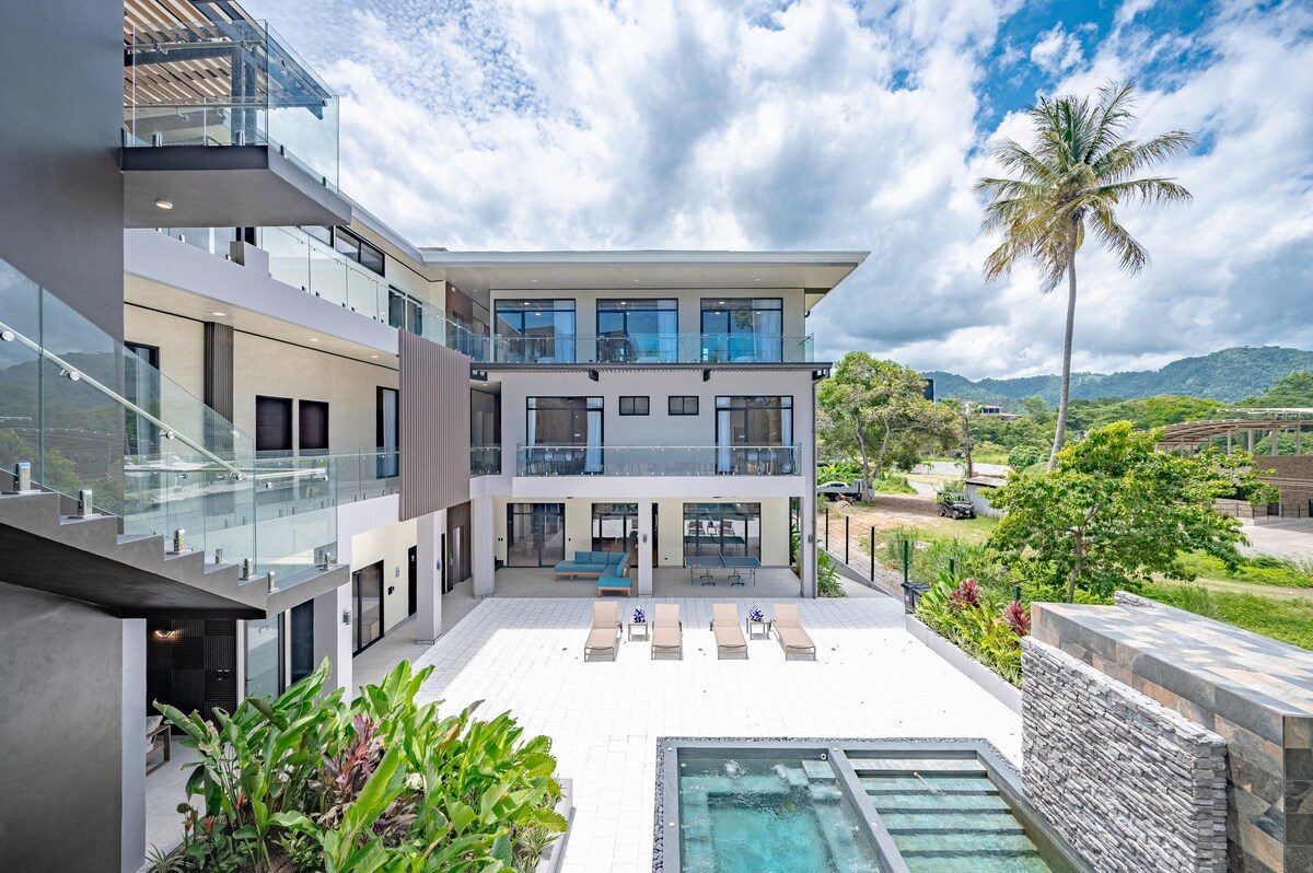 Casa VIP 2 — 15-bedroom beachfront estate in Jacó Beach, modern villa exterior with pool