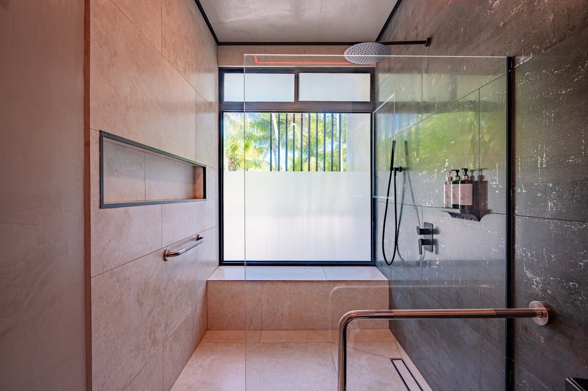 Casa VIP 2 — 15-bedroom beachfront estate in Jacó Beach, white villa exterior