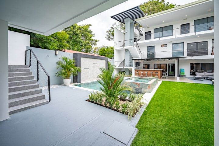 Casa VIP 5 — 13-bedroom beachfront villa in Jacó Beach, modern multi-level villa and lawn