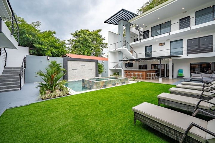 Casa VIP 5 — 13-bedroom beachfront villa in Jacó Beach, rear grounds and villa