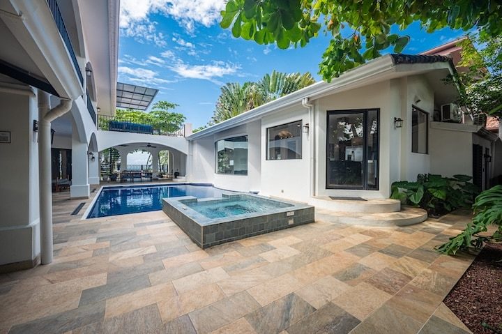 Casa VIP 6 — 11-bedroom beachfront villa in Jacó Beach, pool and terrace beside the villa
