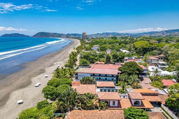 Casa VIP 7 — 9-bedroom beachfront villa in Jacó Beach, aerial of Jacó Beach and coastline