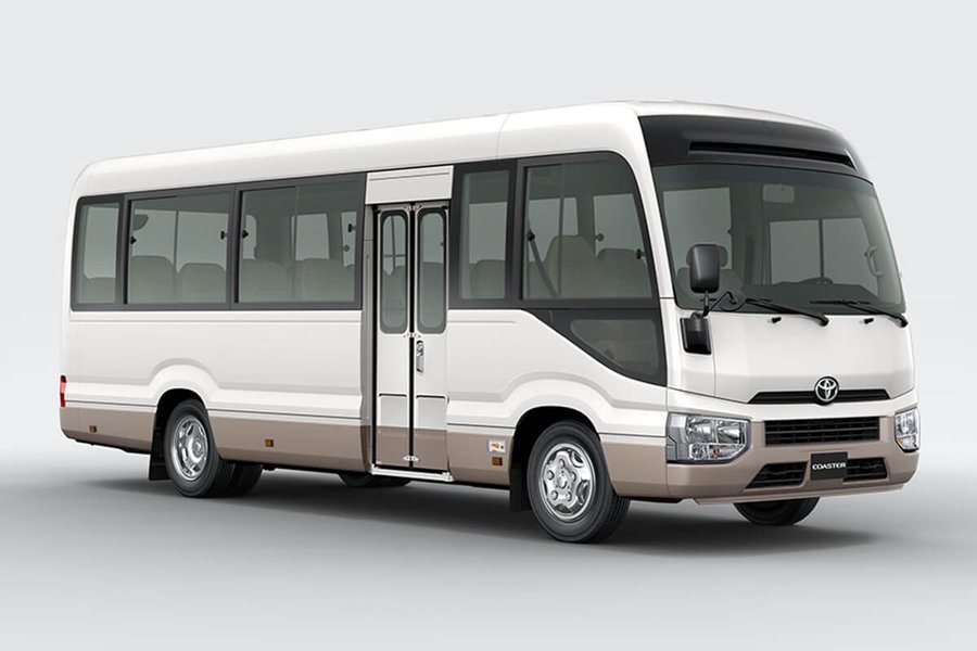 Toyota Coaster mini-coach for large-group airport transfers